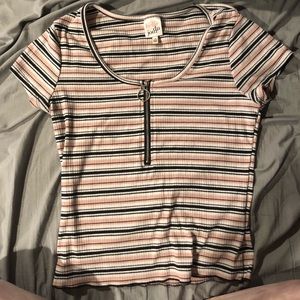 Pink, Black, and White stripped tee shirt with zipper. Brand is Belle Du Jour.